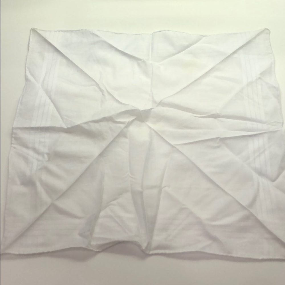 17 x 17 shear white pocket square; good condition